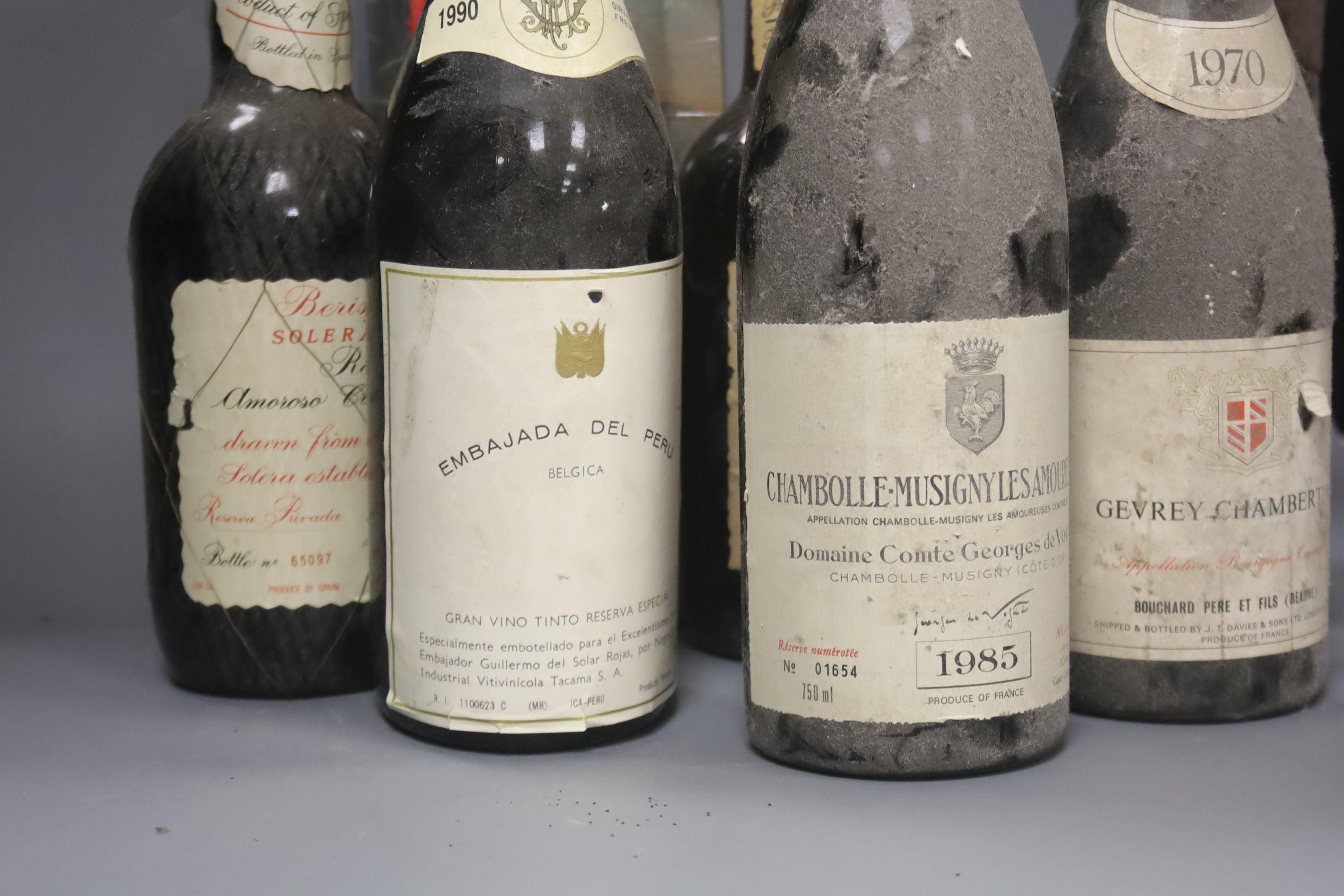 Assorted wines etc. including Chambolle Musigny Les Amoureuses, 1985, one Gevrey Chambertin, 1970, one Manzanilla Pasada Solera, one Amoroso Cream Sherry, one Embajada Del Peru, 1990, one Muscat de Rivesaltes and one box